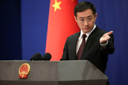 中国外務省の林剣副報道局長=3月20日、北京(EPA時事)