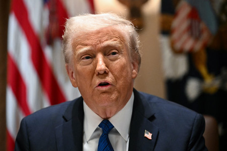 トランプ米大統領=25日、ワシントン(AFP時事)