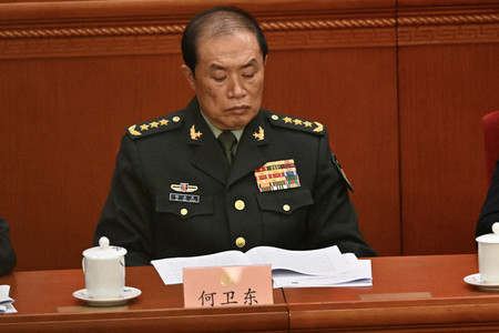 中国の何衛東・中央軍事委員会副主席=3月4日、中国・北京(AFP時事)