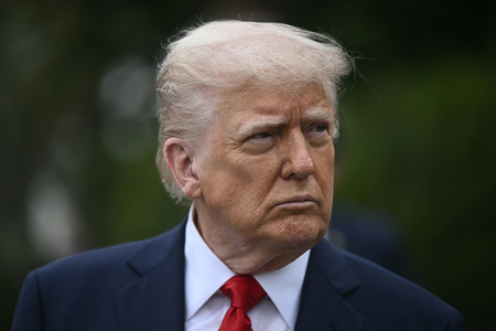 トランプ米大統領=21日、ワシントン(AFP時事)