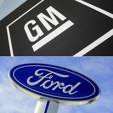 ゼネラル・モーターズ(GM、上)とフォード・モーターのロゴ(AFP時事)