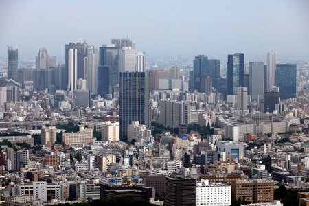 都心の街並み=7月1日、東京都内(EPA時事)